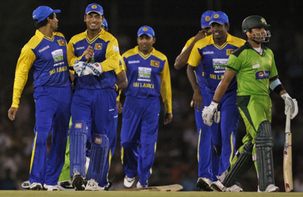 Sri Lanka's fielders celebrate the dismissal of Umar Akmal, Sri Lanka v Pakistan, Asia Cup, Dambulla, June 15, 2010