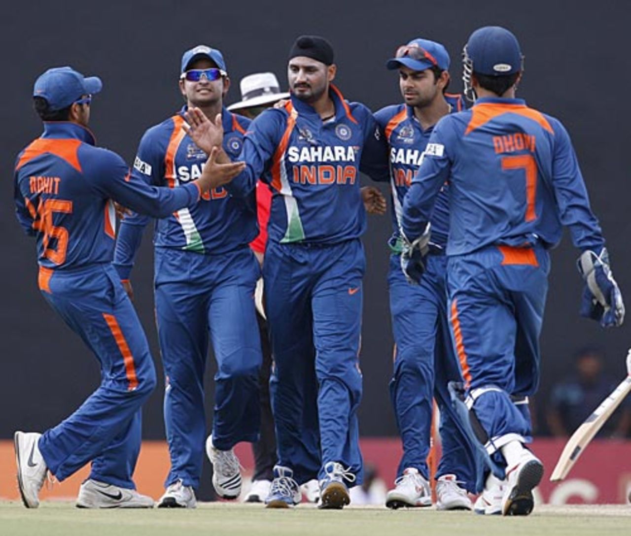 The Indians rush to congratulate Harbhajan Singh, Bangladesh v India, 2nd ODI, Asia Cup, Dambulla, June 16, 2010