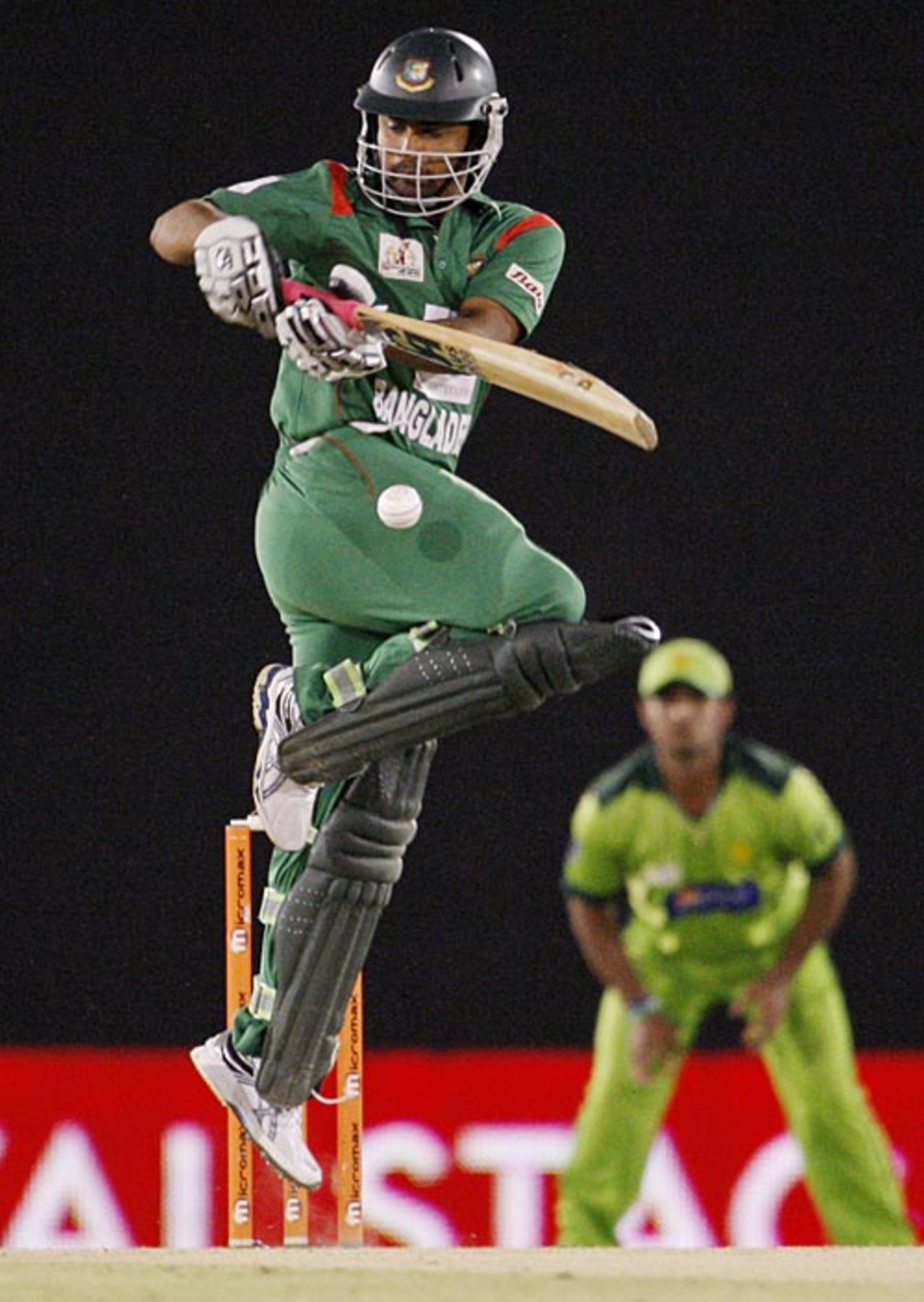 Tamim Iqbal jumps to play the ball, Bangladesh v Pakistan, 5th ODI, Asia Cup, Dambulla, June 21, 2010