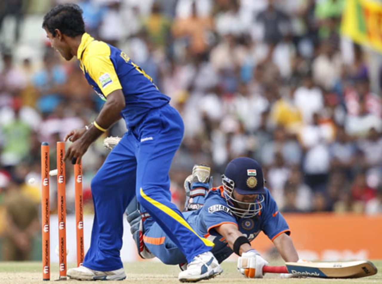Gautam Gambhir puts in a dive but is caught short of his crease, Sri Lanka v India, Final, Dambulla, June 24, 2010