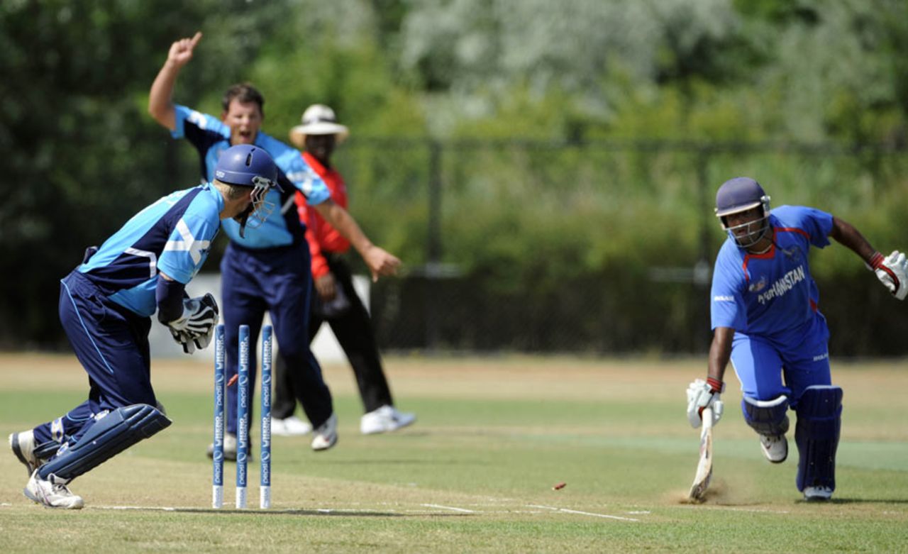 Aghanistan's Mohammad Shahzad is run out, Afghanistan v Scotland, ICC WCL Division 1, Rotterdam, July 9, 2010 