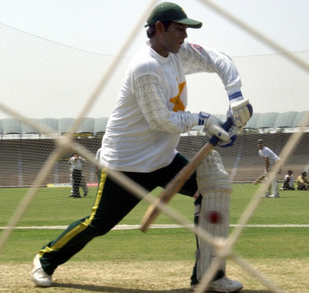 Rashid Latif plays the forward defence at a net session, Multan, September 2, 2003