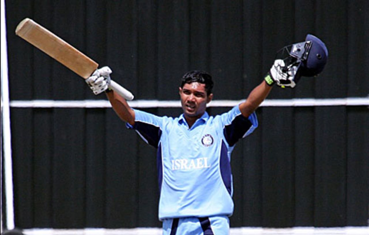 Israel's Eshkol Solomon celebrates his century, Gibraltar v Israel, World Cricket League Europe Division Two, Guernsey, July 17, 2010