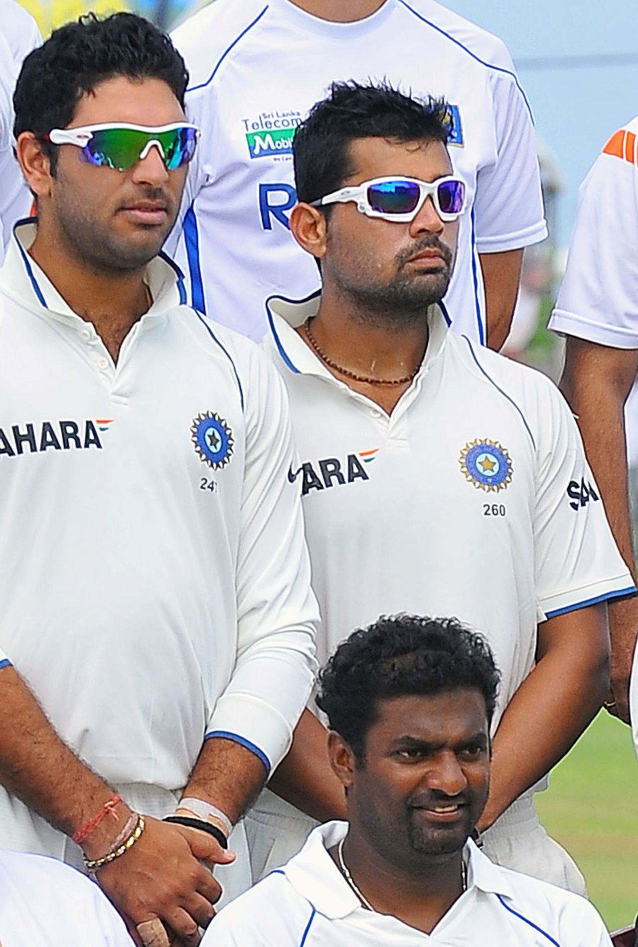 Yuvraj Singh and M Vijay with Muttiah Muralitharan in a photo shoot, Sri Lanka v India, 1st Test, Galle, 1st day, July 18, 2010