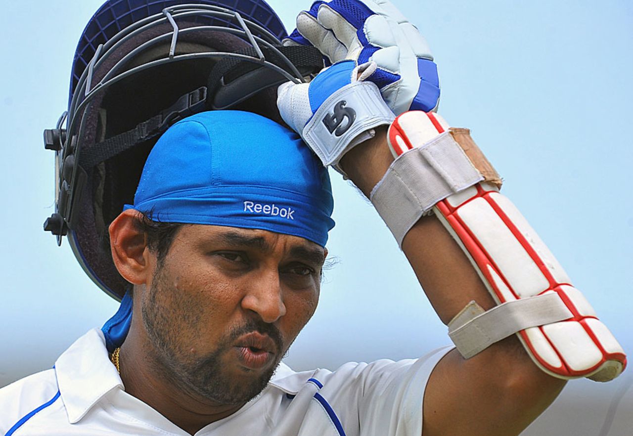 A disappointed Tillakaratne Dilshan walks back after scoring a brisk 25, Sri Lanka v India, 1st Test, Galle, 1st day, July 18, 2010