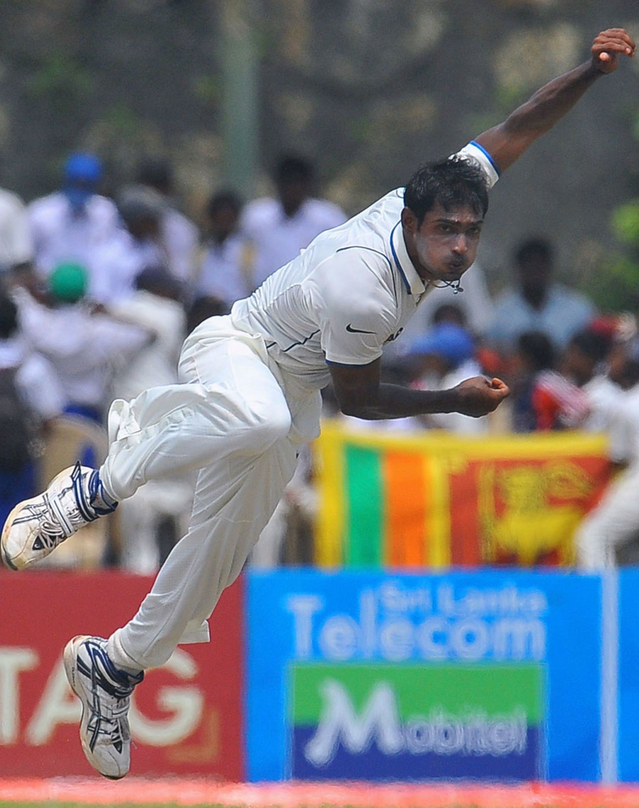 Abhimanyu Mithun steams in during his opening spell in Test cricket, Sri Lanka v India, 1st Test, Galle, 1st day, July 18, 2010