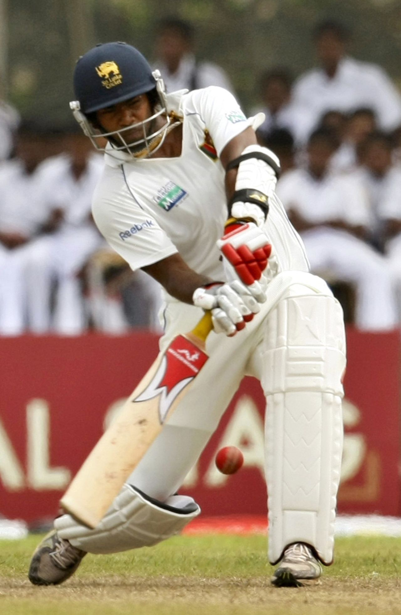 Lasith Malinga is set to launch the ball towards midwicket, 1st Test, Galle, 3rd day, July 20, 2010