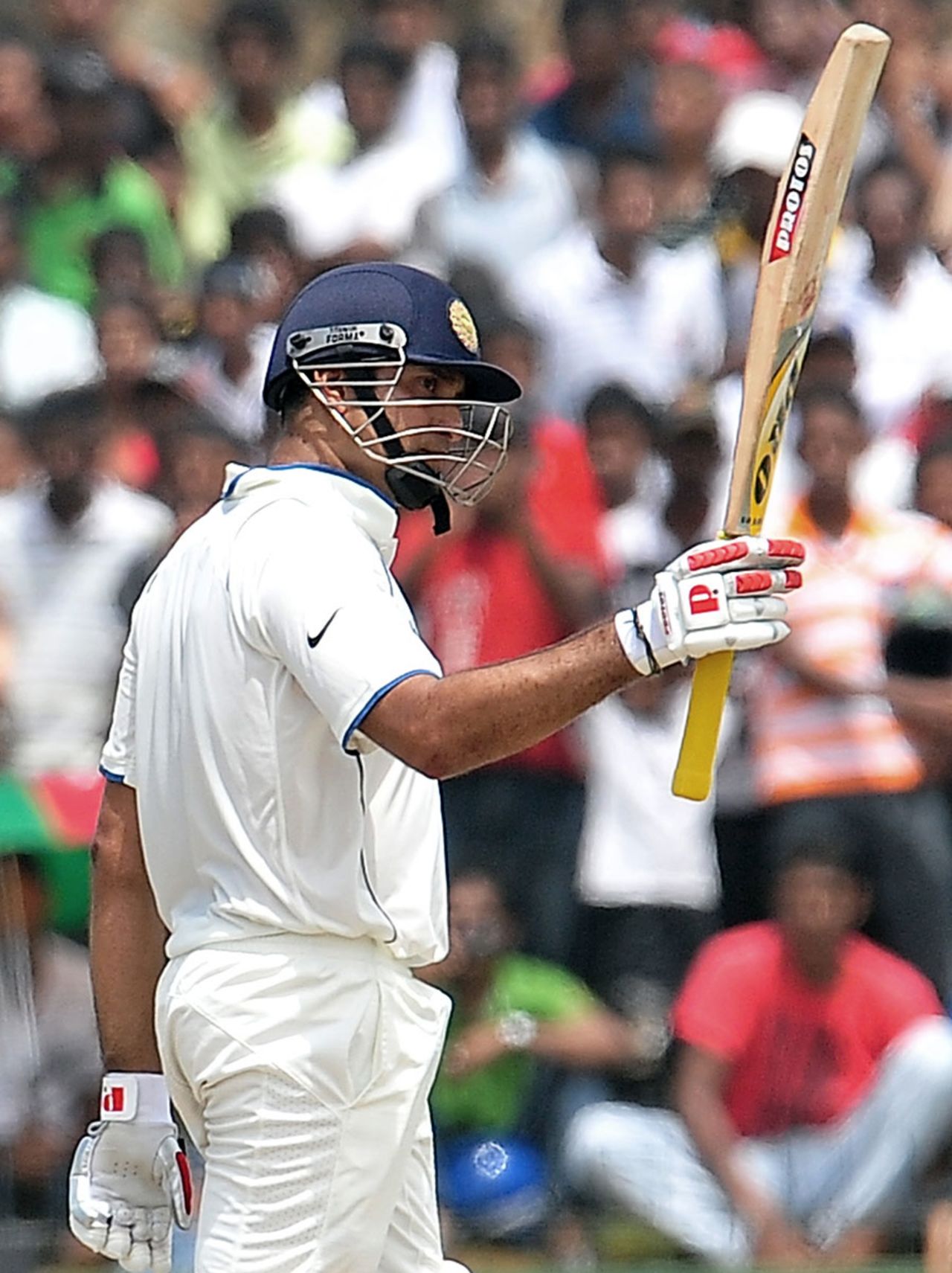 VVS Laxman raises his bat after reaching a fighting fifty, Sri Lanka v India, 1st Test, Galle, 5th day, July 22, 2010