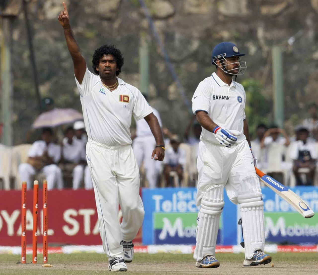 Lasith Malinga cleans up MS Dhoni in his first over of the day, Sri Lanka v India, 1st Test, Galle, 5th day, July 22, 2010