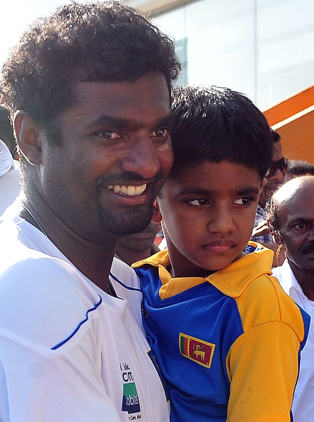 Muttiah Muralitharan carries his son Naren, Sri Lanka v India, 1st Test, Galle, 5th day, July 22, 2010