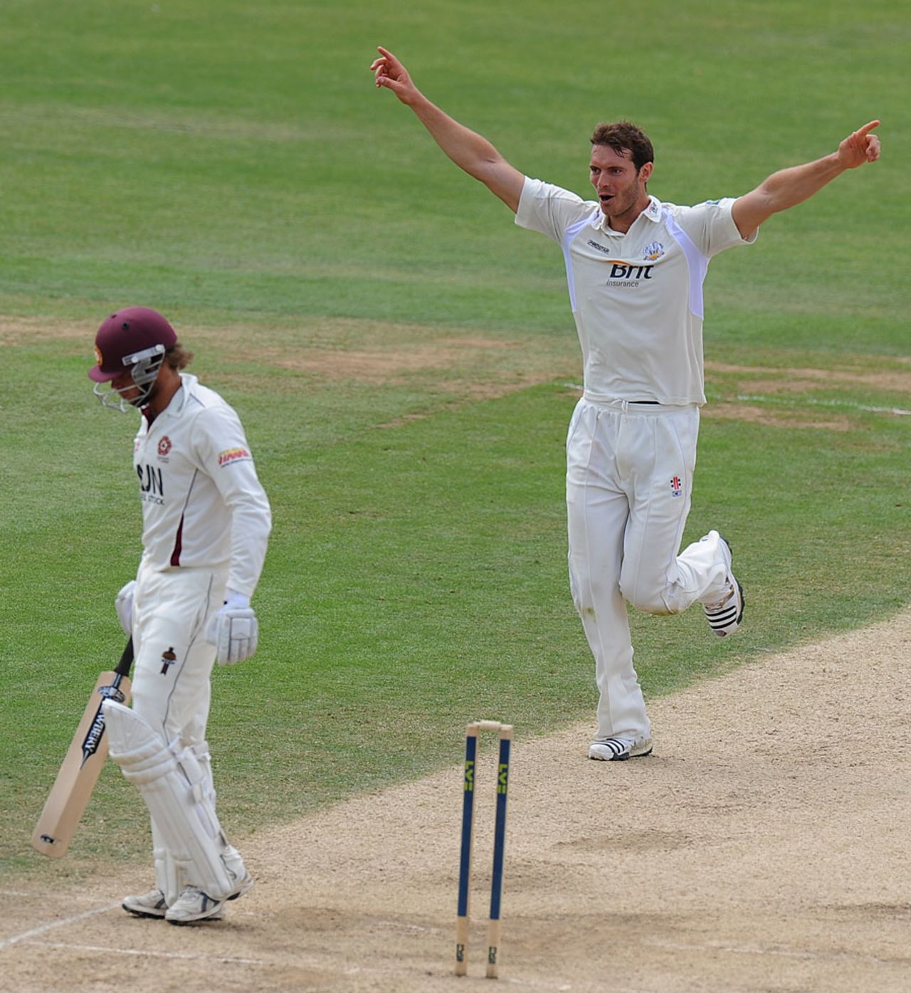 Chris Tremlett celebrates after uprooting Ben Howgego's off stump, Surrey v Northamptonshire, County Championship Division Two, The Oval, July 21, 2010