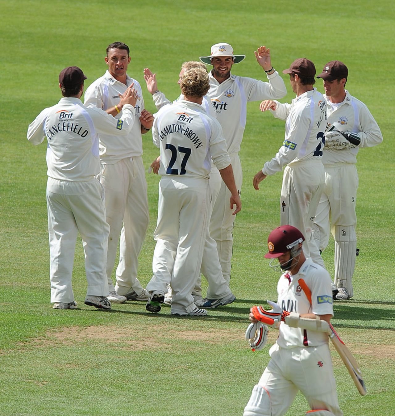 Andre Nel is congratulated by his Surrey team-mates after removing Stephen Peters, Surrey v Northamptonshire, County Championship Division Two, The Oval, July 21, 2010