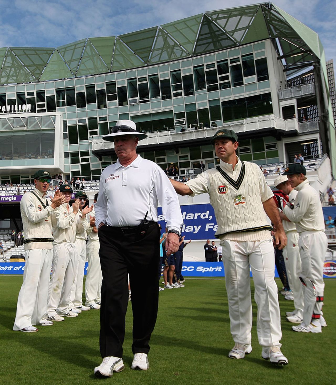 Rudi Koertzen walks through the guard of honour given to him by the players for his final morning as a Test umpire, Pakistan v Australia, 2nd Test, Headingley, 4th day, July 24 2010
