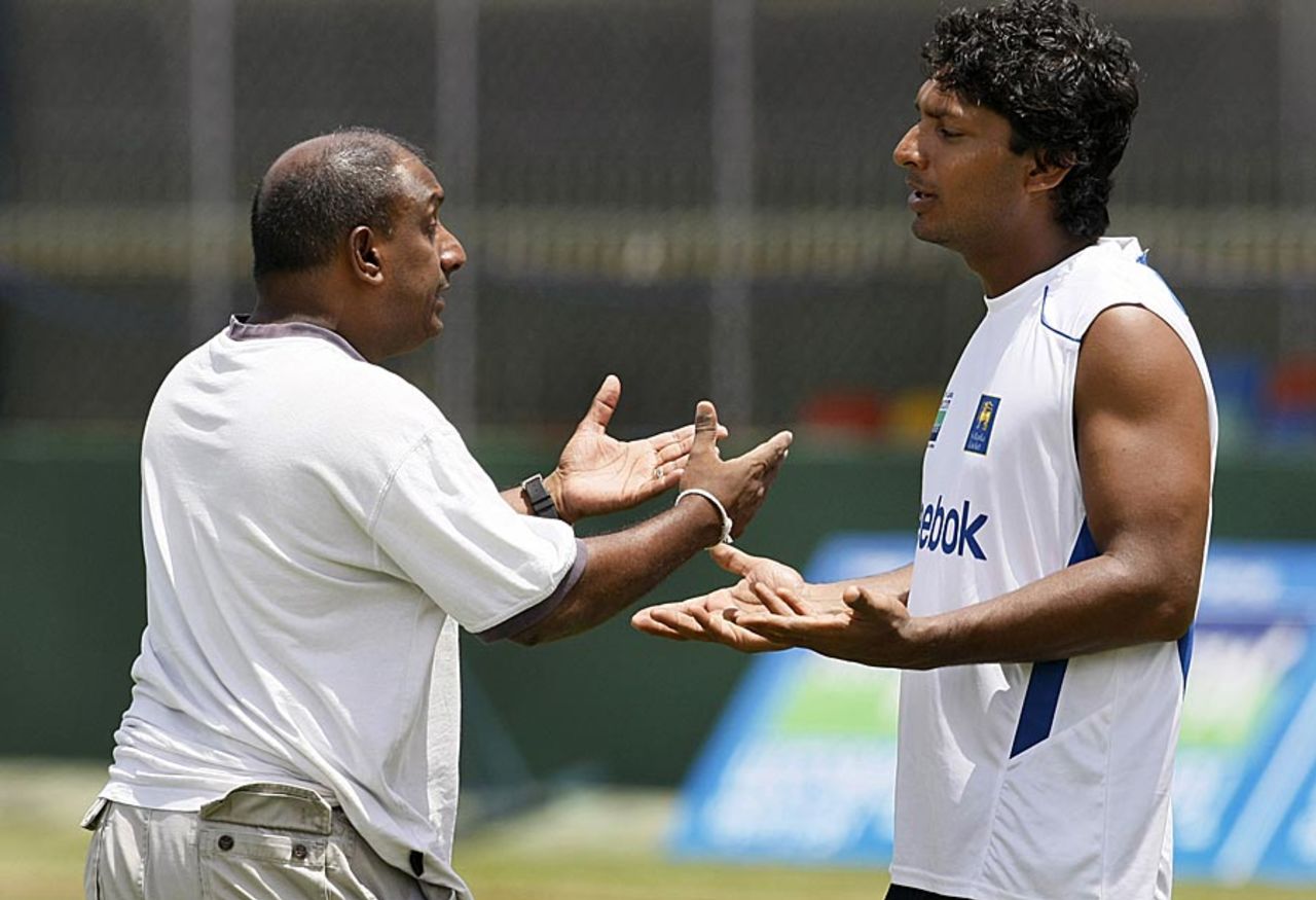 Aravinda de Silva and Kumar Sangakkara appear to be arguing over a point, Colombo, July 25, 2010
