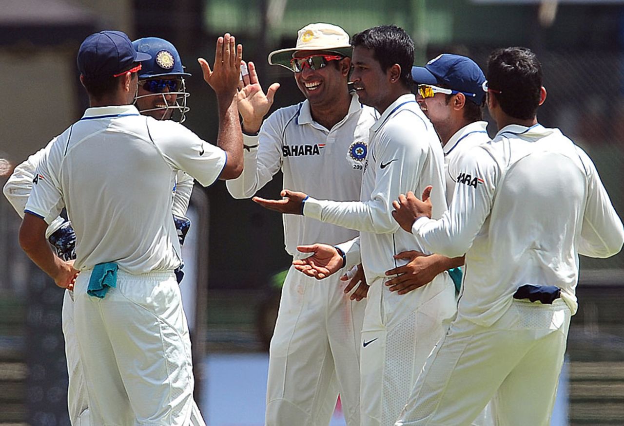The Indians celebrate their first breakthrough, Sri Lanka v India, 2nd Test, SSC, 1st day, July 26, 2010