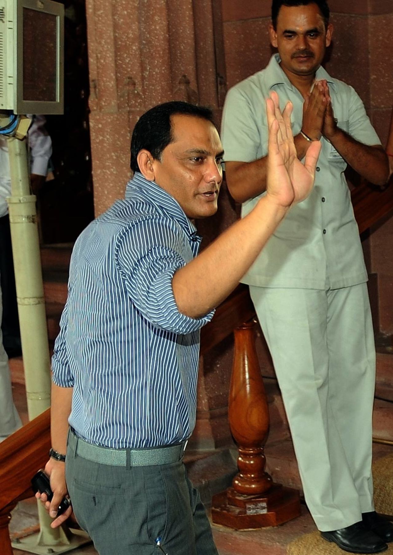 Former Indian captain and current MP Mohammad Azharuddin arrives for the monsoon session of the parliament, New Delhi, July 26, 2010
