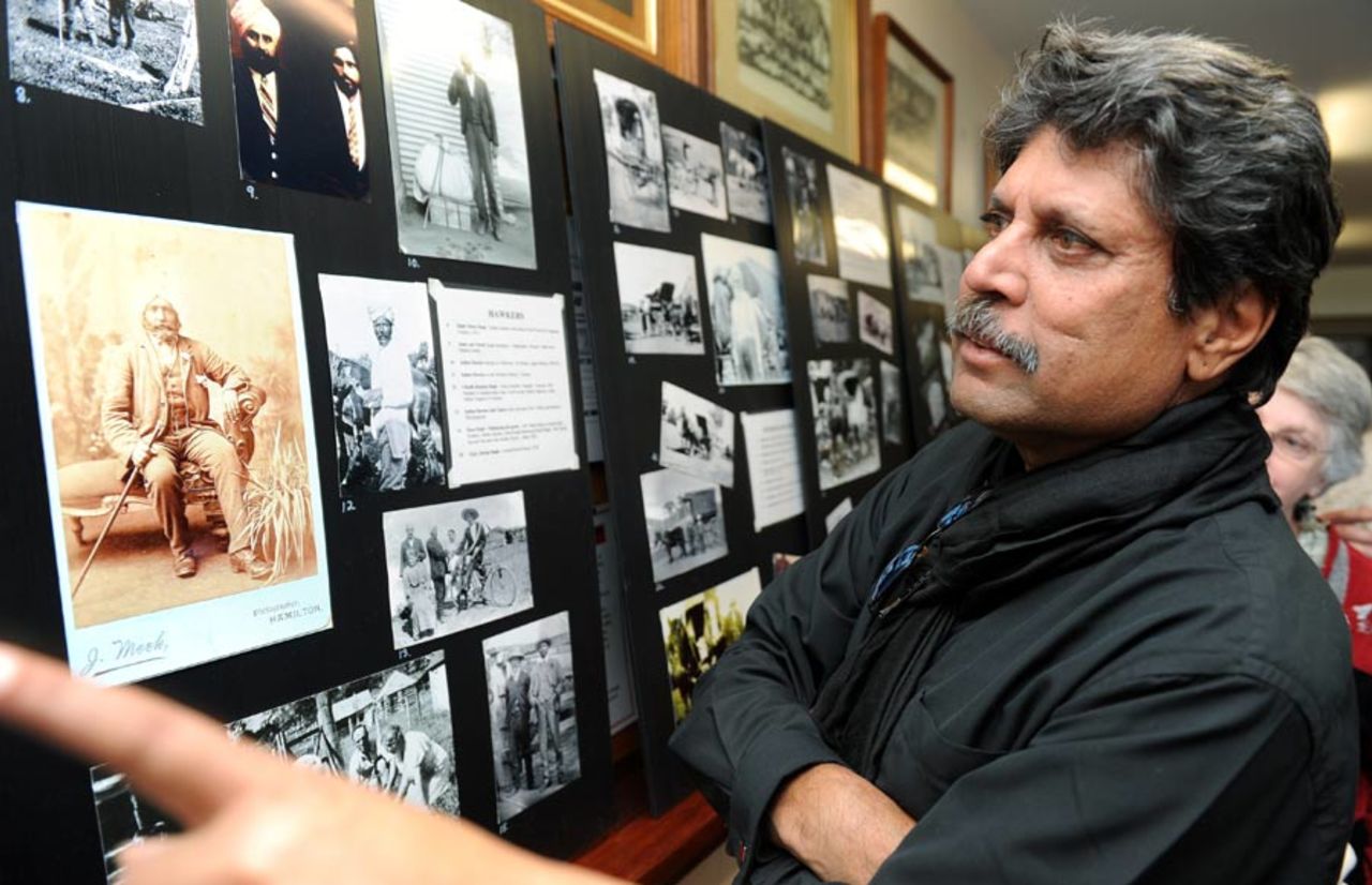 Kapil Dev inspects a history of Indian hawkers in Victoria before attending a ceremony where the ashes of hawker Pooran Singh were claimed after 63 years, Warrnambool, July 25, 2010