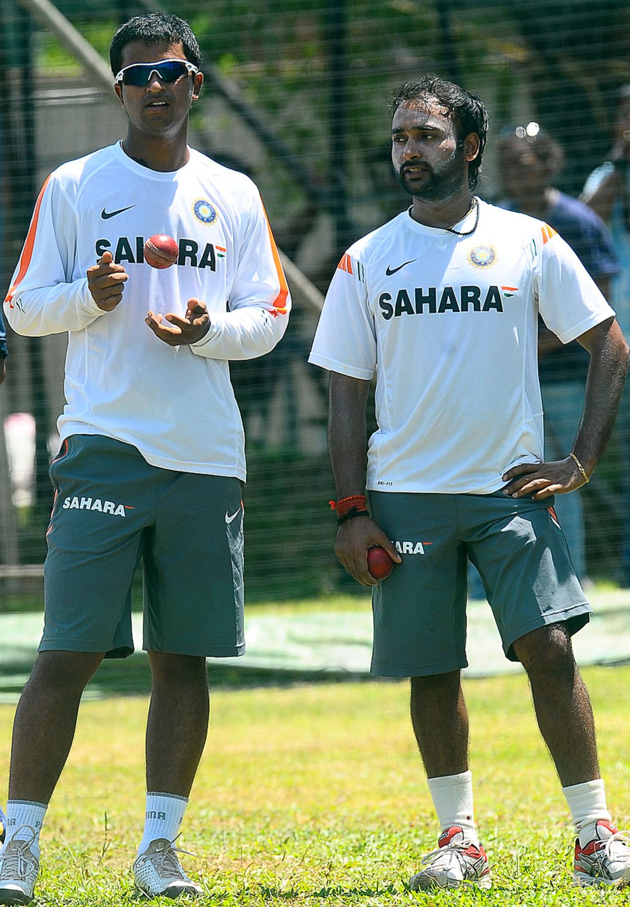 Pragyan Ojha and Amit Mishra have a chat during training, Colombo, August 1, 2010