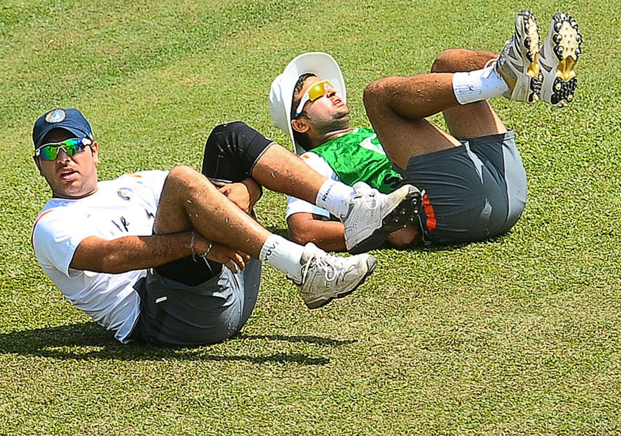 Yuvraj Singh and Suresh Raina warm up, Colombo, August 1, 2010