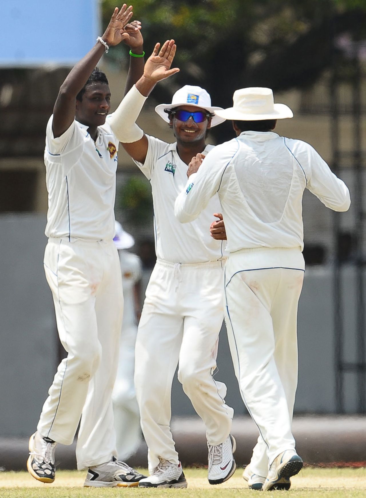 Ajantha Mendis celebrates the fall of Suresh Raina with his team-mates, Sri Lanka v India, 3rd Test, P Sara Oval, 3rd day, August 5, 2010