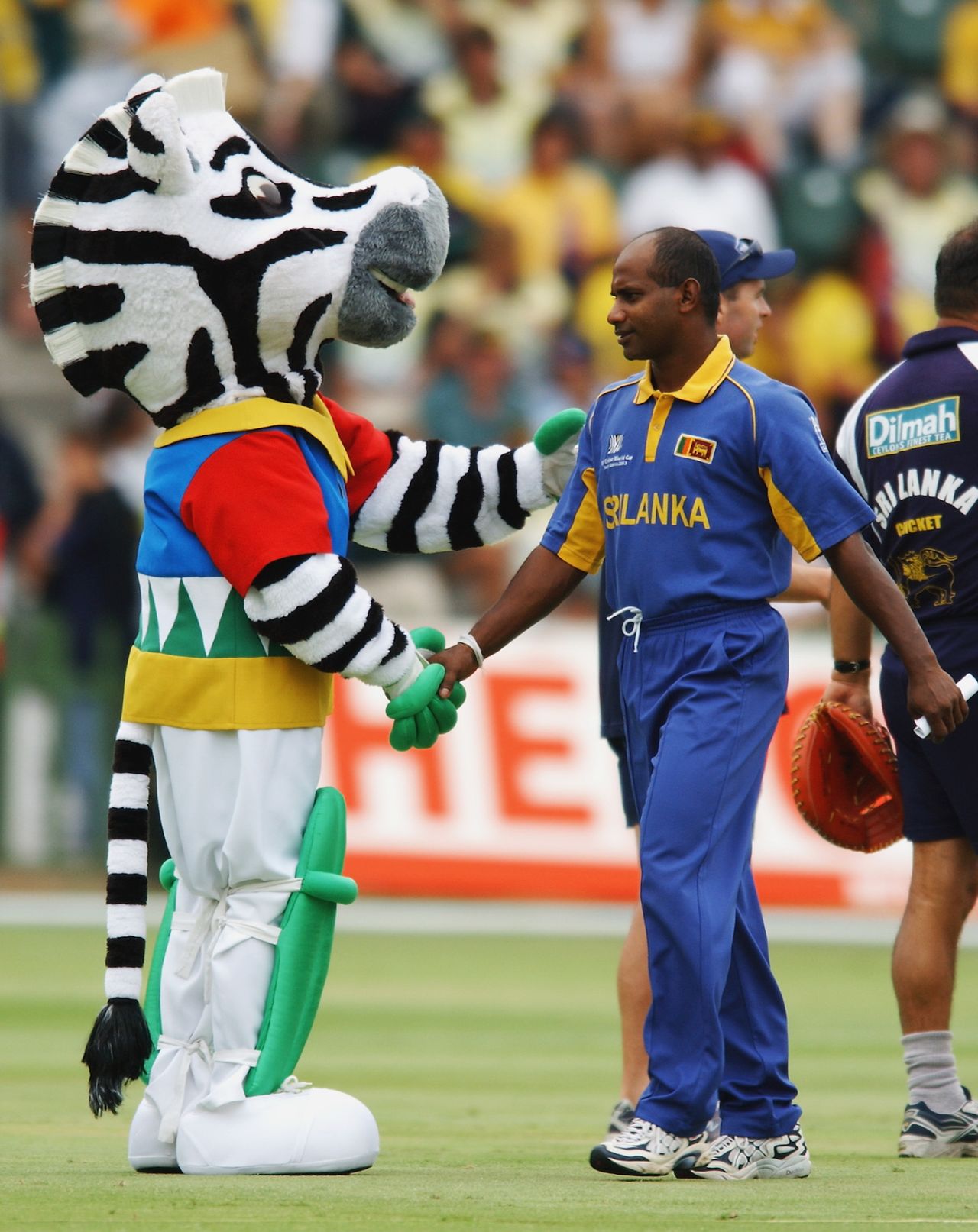 Dazzler, the World Cup mascot, shakes hands with Sanath Jayasuriya, Australia v Sri Lanka, World Cup semi-final, Port Elizabeth, March 18, 2003