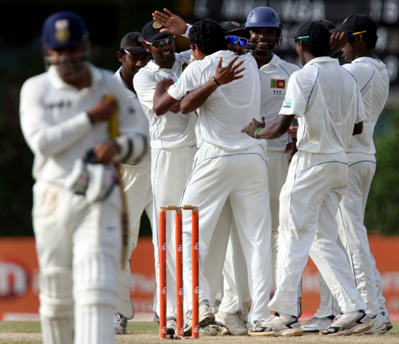 Suraj Randiv is mobbed by his teammates after getting Virender Sehwag for a duck, Sri Lanka v India, 3rd Test, P Sara Oval, 4th day, August 6, 2010
