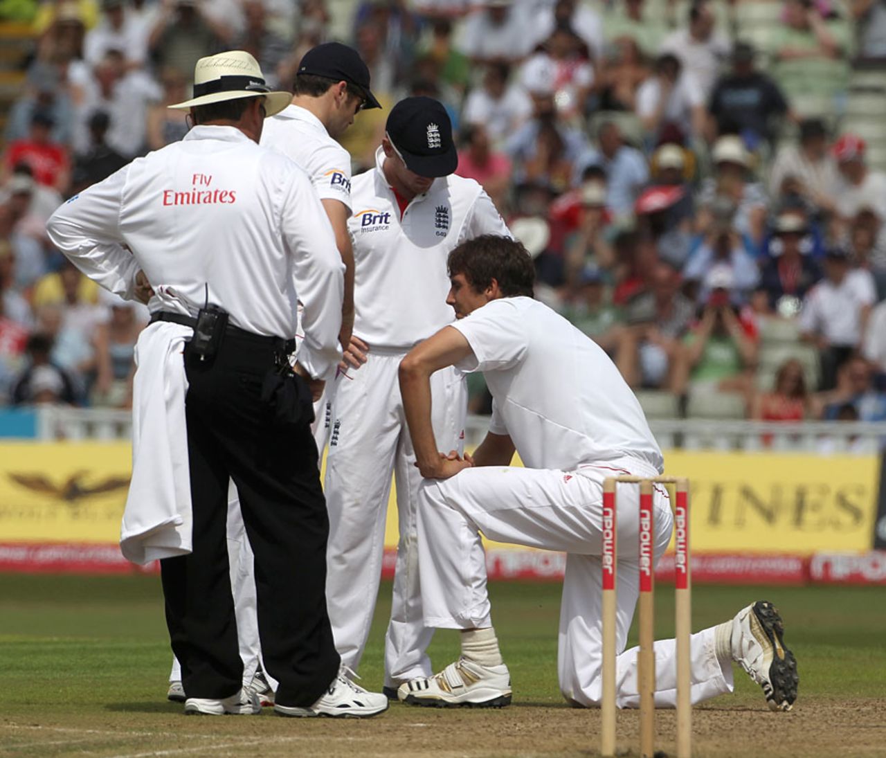 Steven Finn had to leave the field for treatment soon after falling over in his follow through, England v Pakistan, 2nd Test, Edgbaston, August 8, 2010