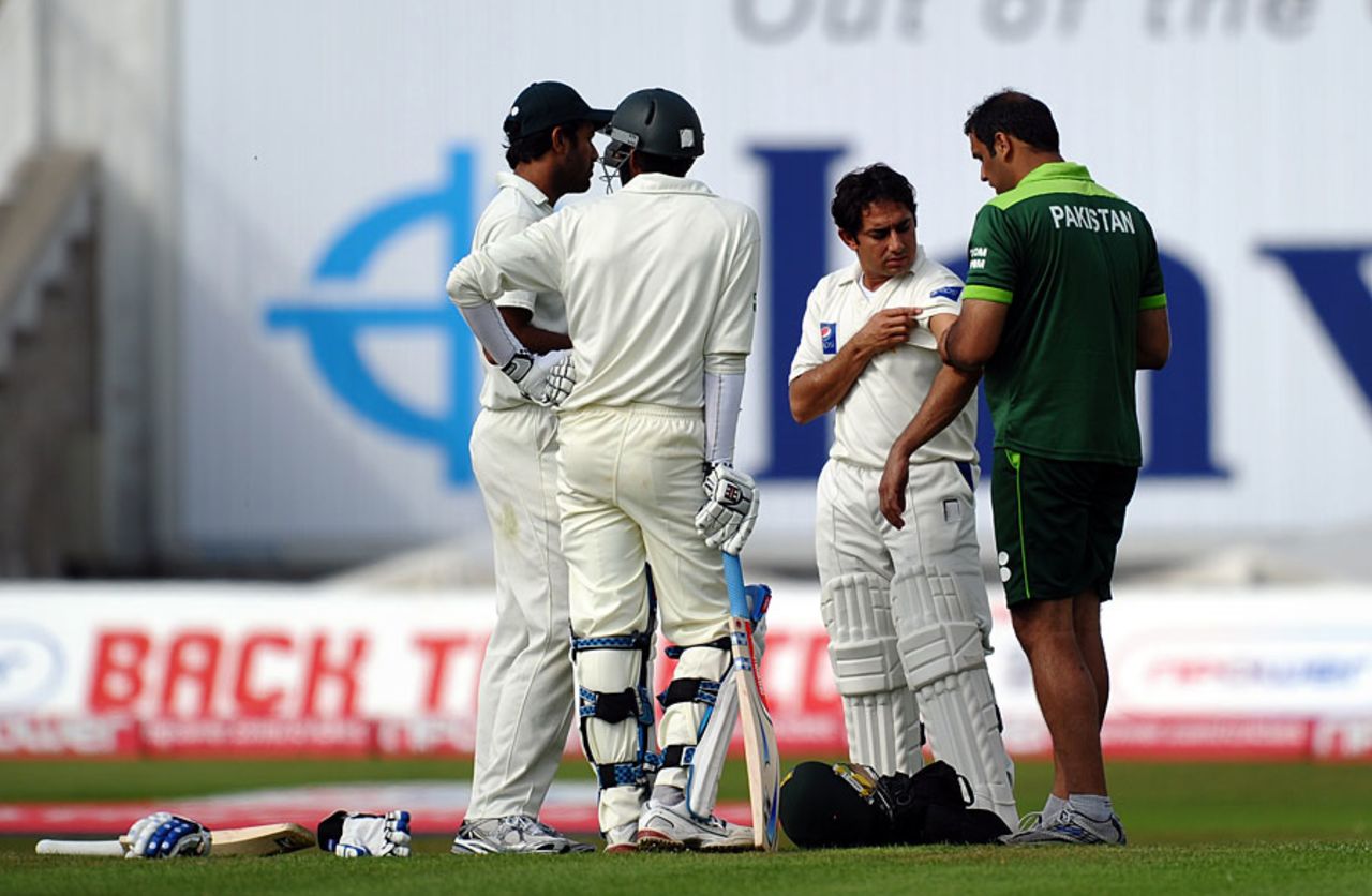 Saeed Ajmal needed treatment after taking a blow to the elbow, England v Pakistan, 2nd Test, Edgbaston, August 8, 2010