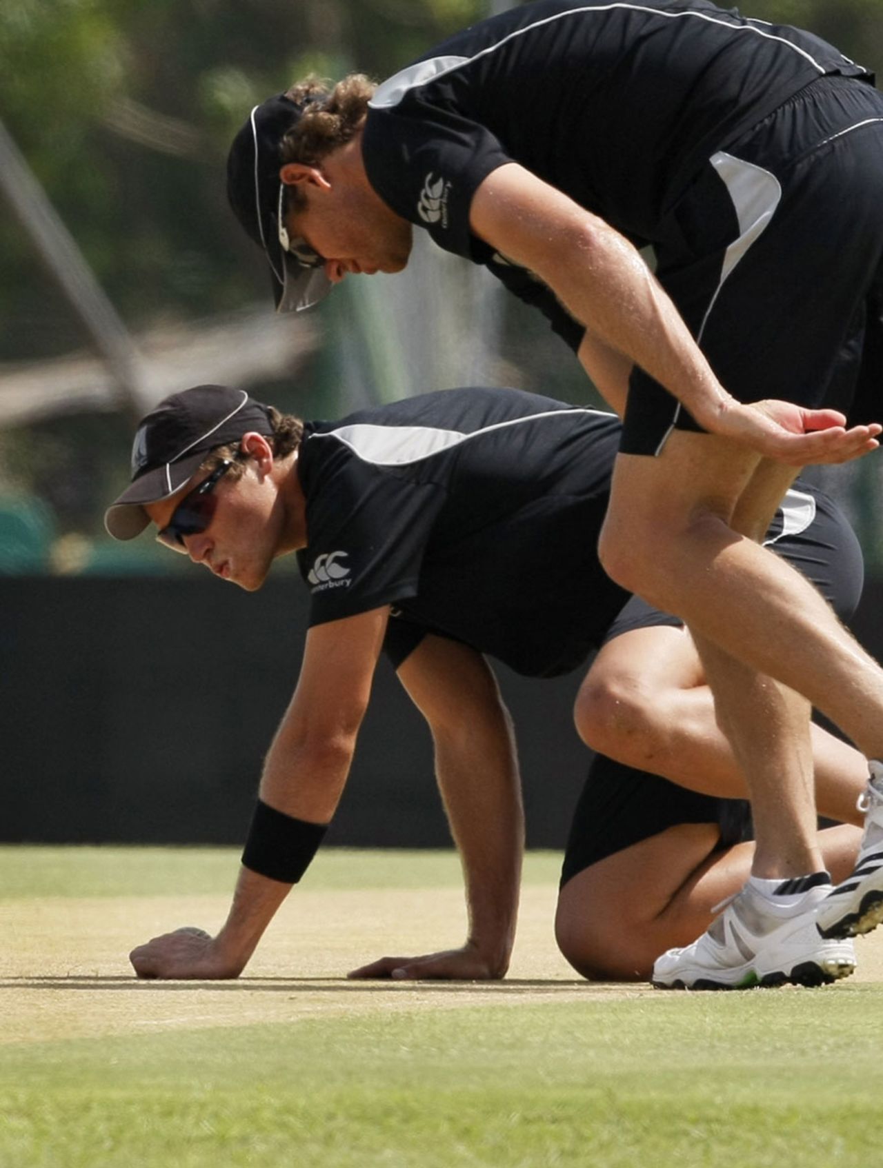 Jacob Oram and BJ Watling inspect the pitch, Dambulla, August 12, 2010