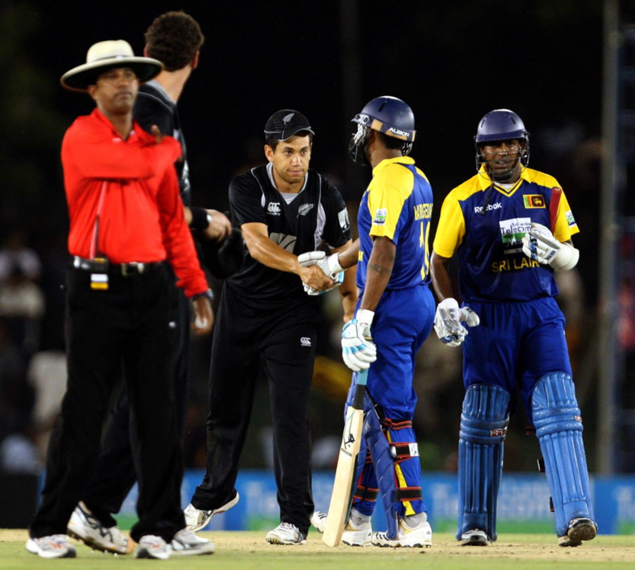 Ross Taylor congratulates Chamara Kapugedera on Sri Lanka's victory, Sri Lanka v New Zealand, tri-series, 2nd ODI, Dambulla, August 13, 2010