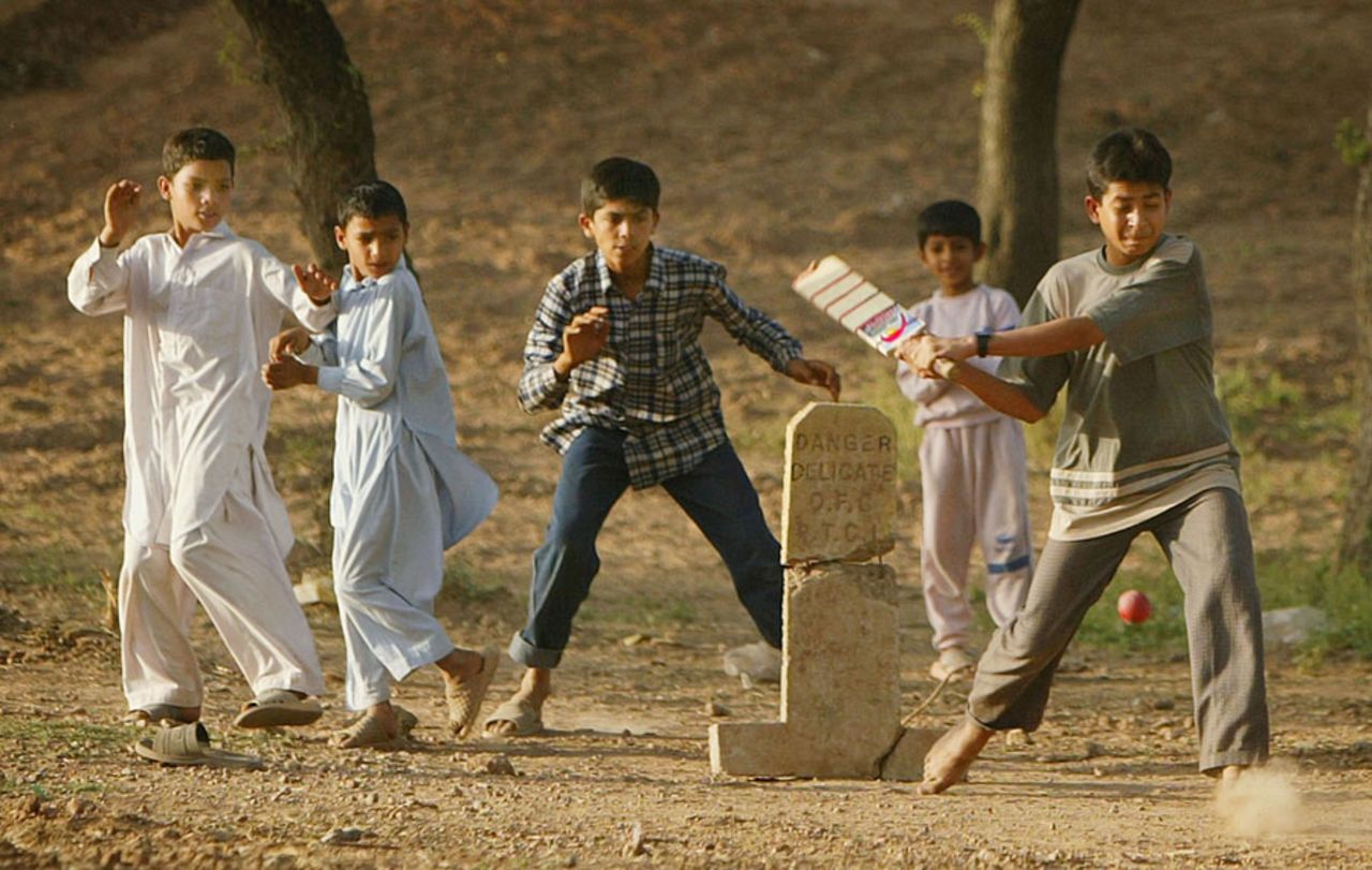  Children play street cricket, Rawalpindi, March 21, 2004 