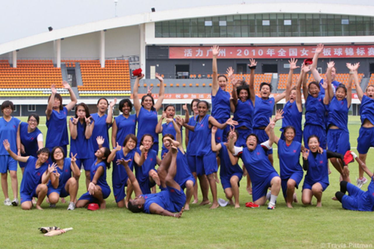 Girls Gone Wild! Members of the Hong Kong Women's Cricket Training Squad let off a little steam after a hard work out at the Guangzhou Cricket Stadium