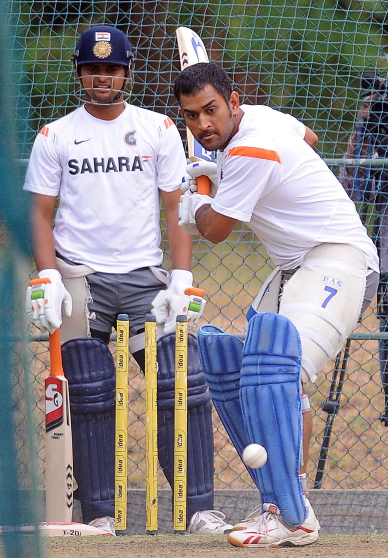 MS Dhoni and Suresh Raina prepare for the match against Sri Lanka, Dambulla, August 15, 2010