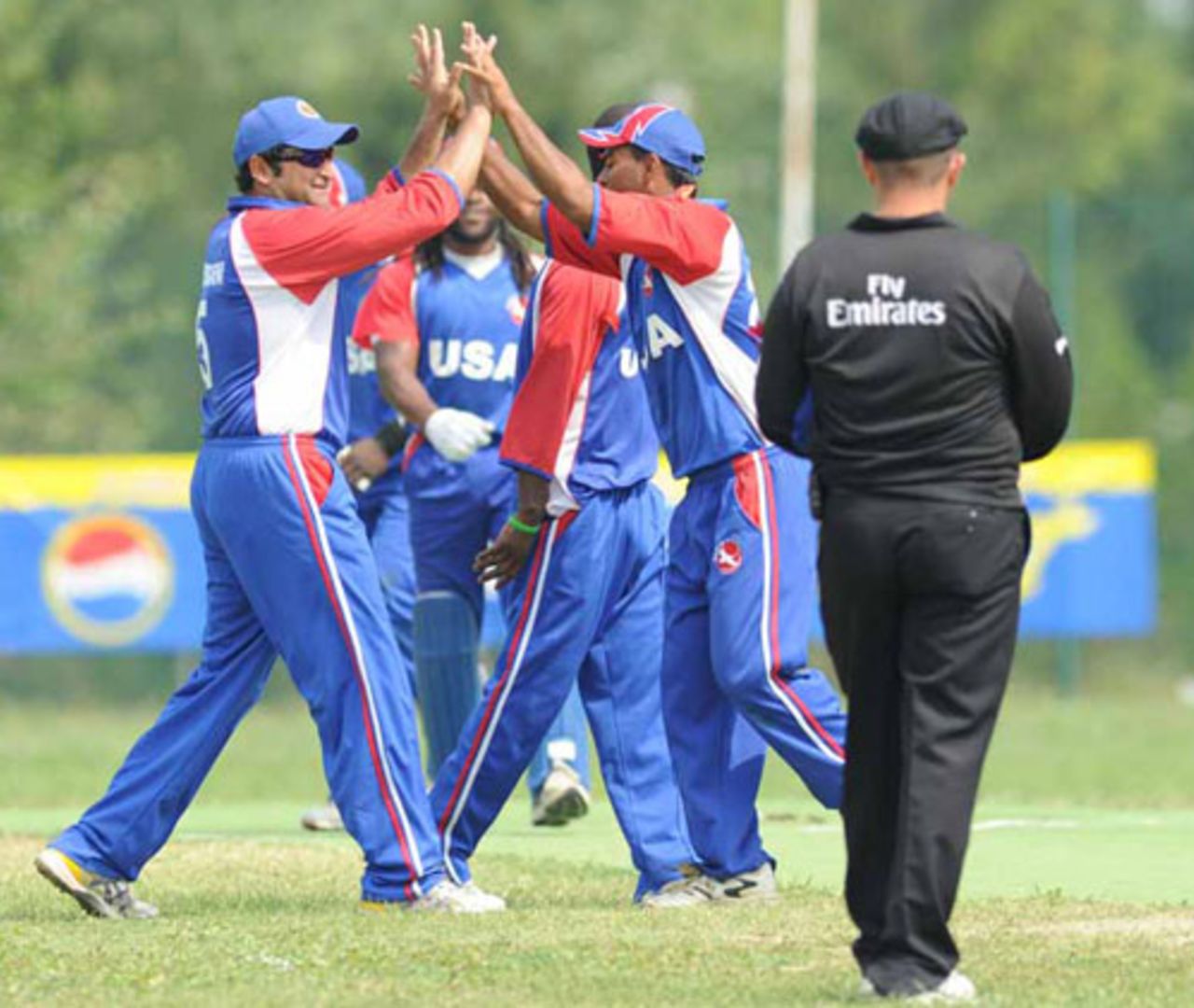 USA celebrate the dismissal of Alessandro Bonora, Italy v USA, ICC WCL Div. 4 final, Pianoro, August 21, 2010