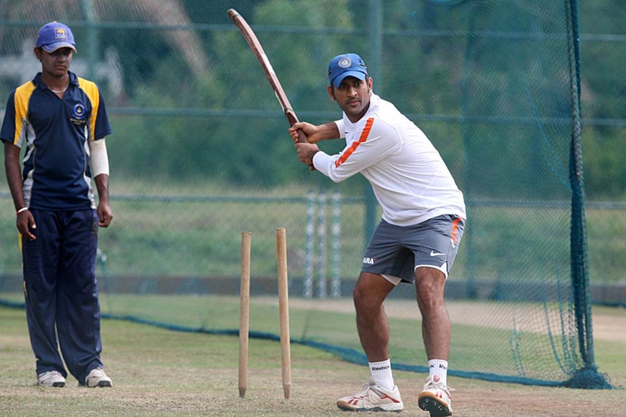 MS Dhoni has a swing at the nets, Dambulla, August 23, 2010