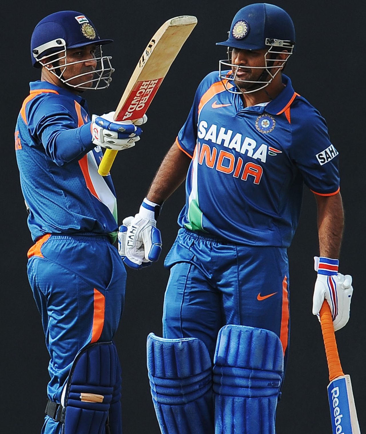 Virender Sehwag brings up his fifty in MS Dhoni's company, India v New Zealand, tri-series, 6th ODI, Dambulla, August 25, 2010