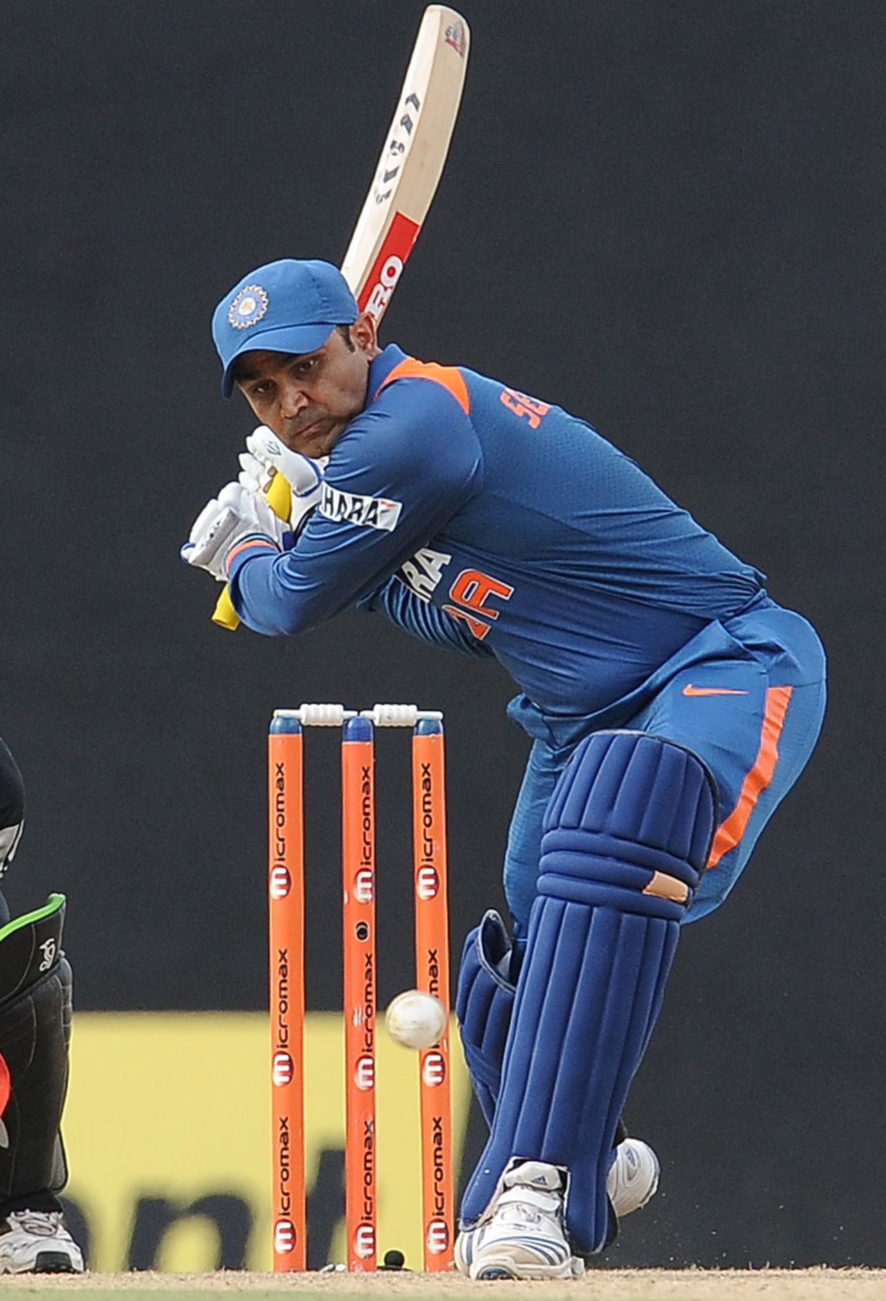 Virender Sehwag gets ready to hit straight down the ground, India v New Zealand, tri-series, 6th ODI, Dambulla, August 25, 2010