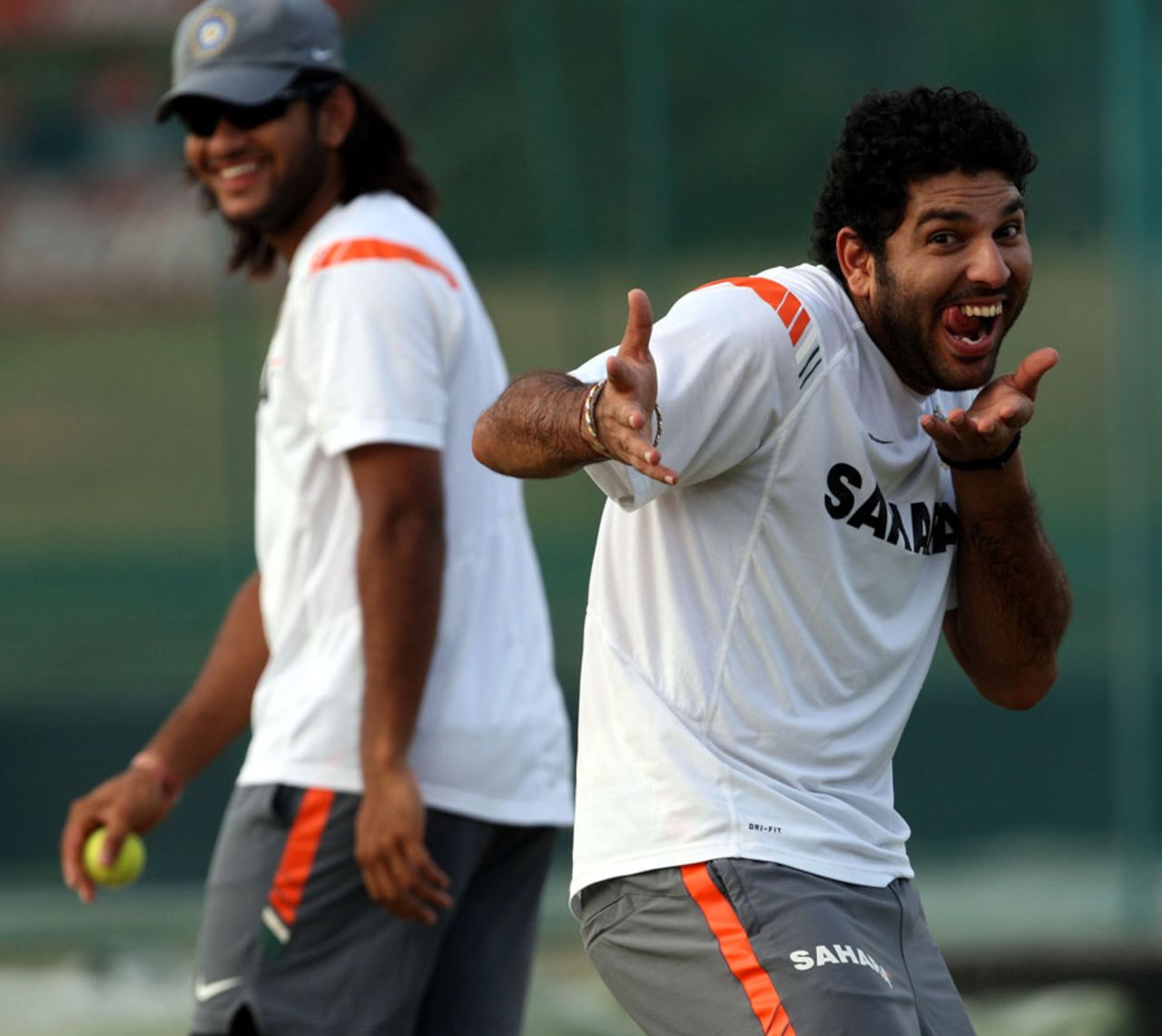 Yuvraj Singh strikes a funny pose as Saurabh Tiwary looks on, Dambulla, August 27, 2010