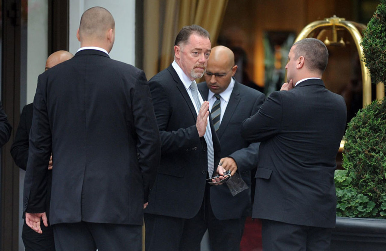 England's security manager Reg Dickason speaks to officials outside the Marriott hotel where Pakistan were staying, England v Pakistan, 4th Test, Lord's, August 29, 2010