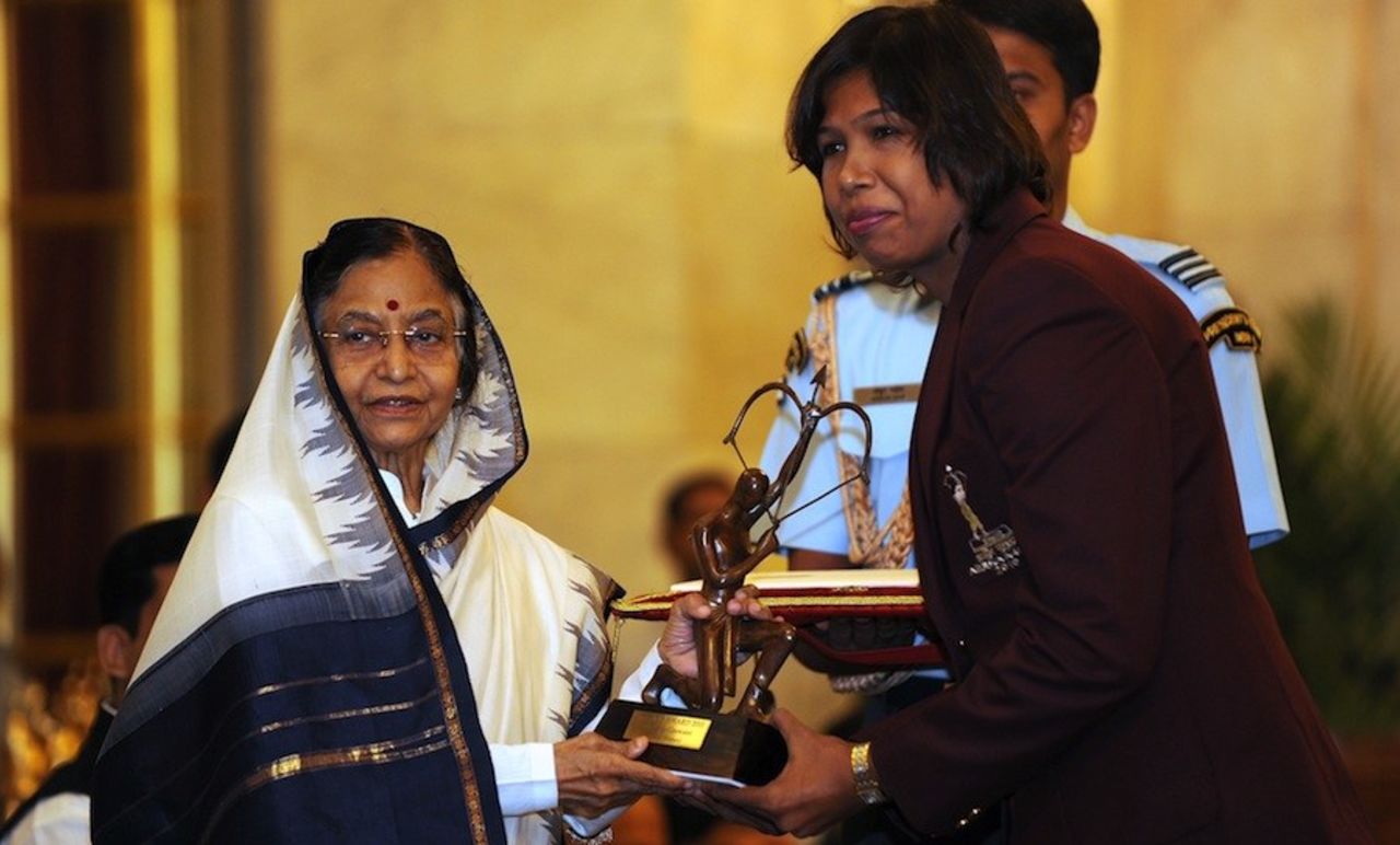 Jhulan Goswami, the India women's captain, receives the Arjuna award from India's president, Delhi, August 29, 2010
