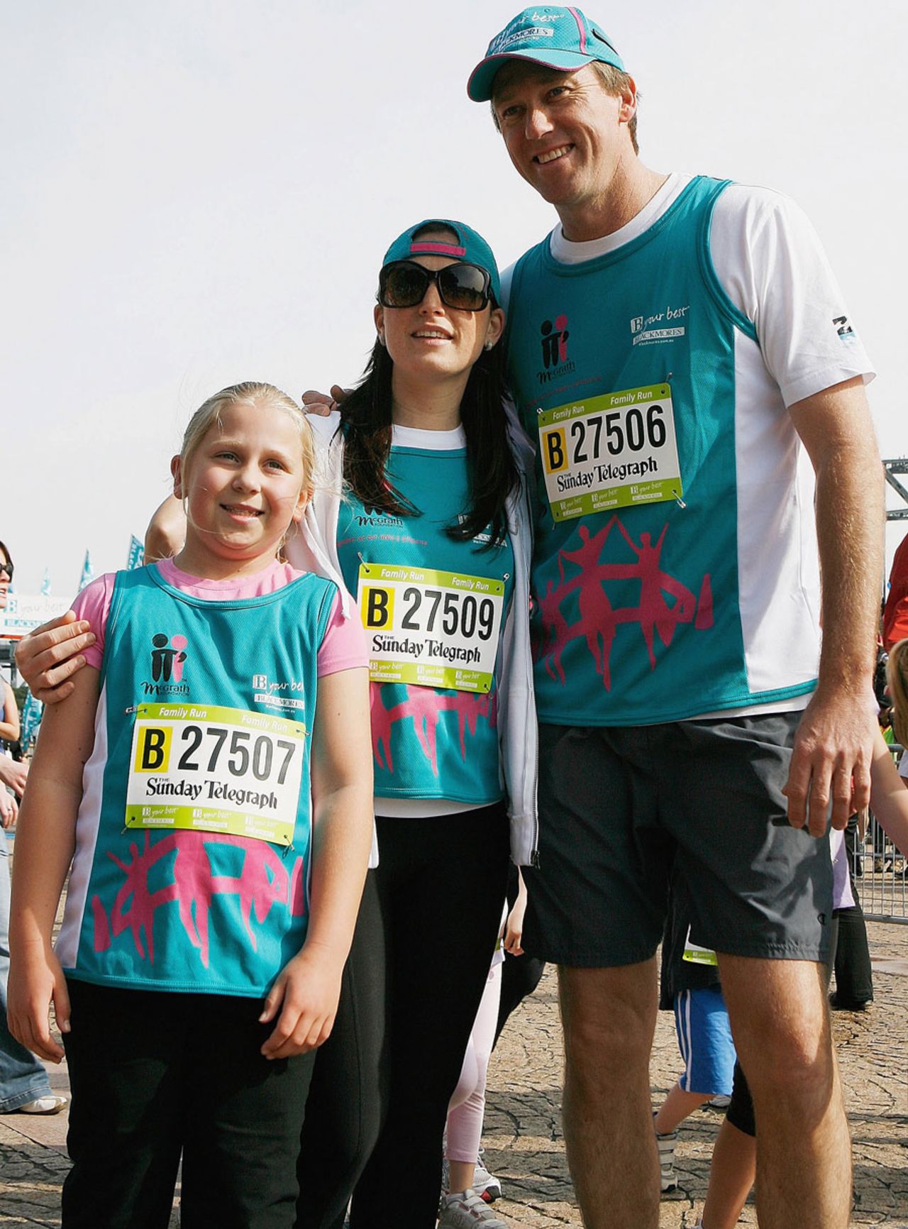 Glenn McGrath with his fiance and daughter after completing the 4km Family Fun Run, Sydney, September 19, 2010 