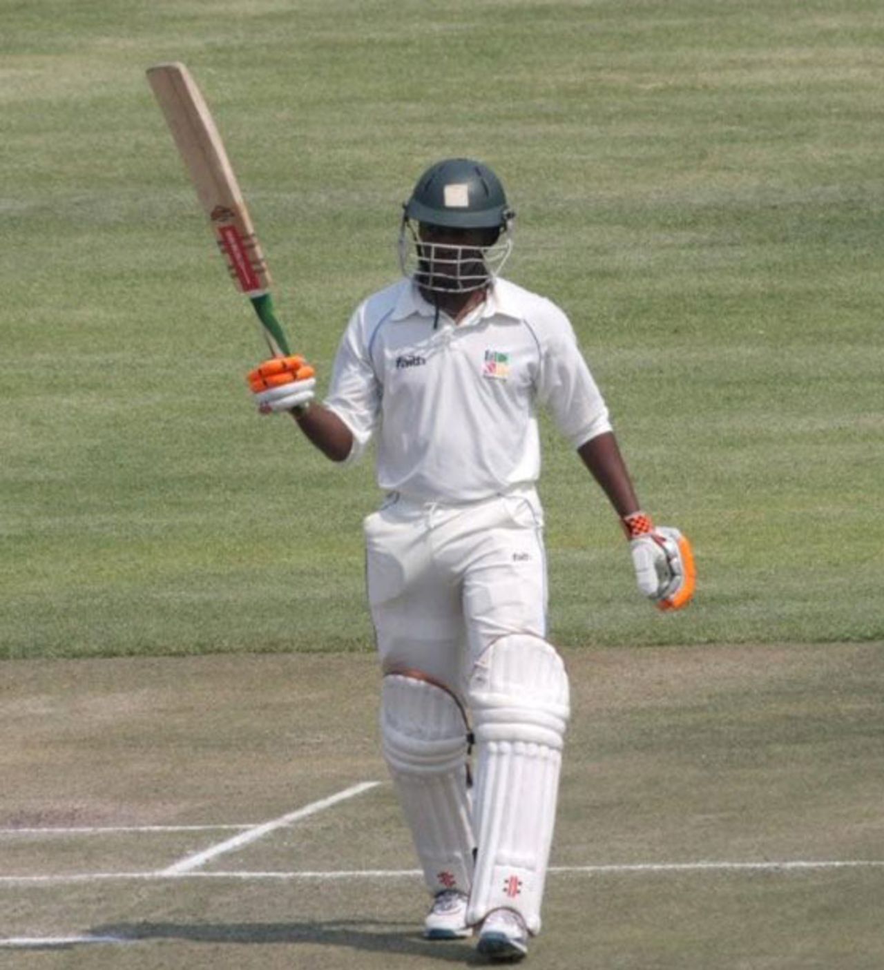 Keith Dabengwa acknowledges the cheers after his century, Zimbabwe XI v Ireland, ICC Intercontinental Cup, Harare, 3rd day, September 21, 2010