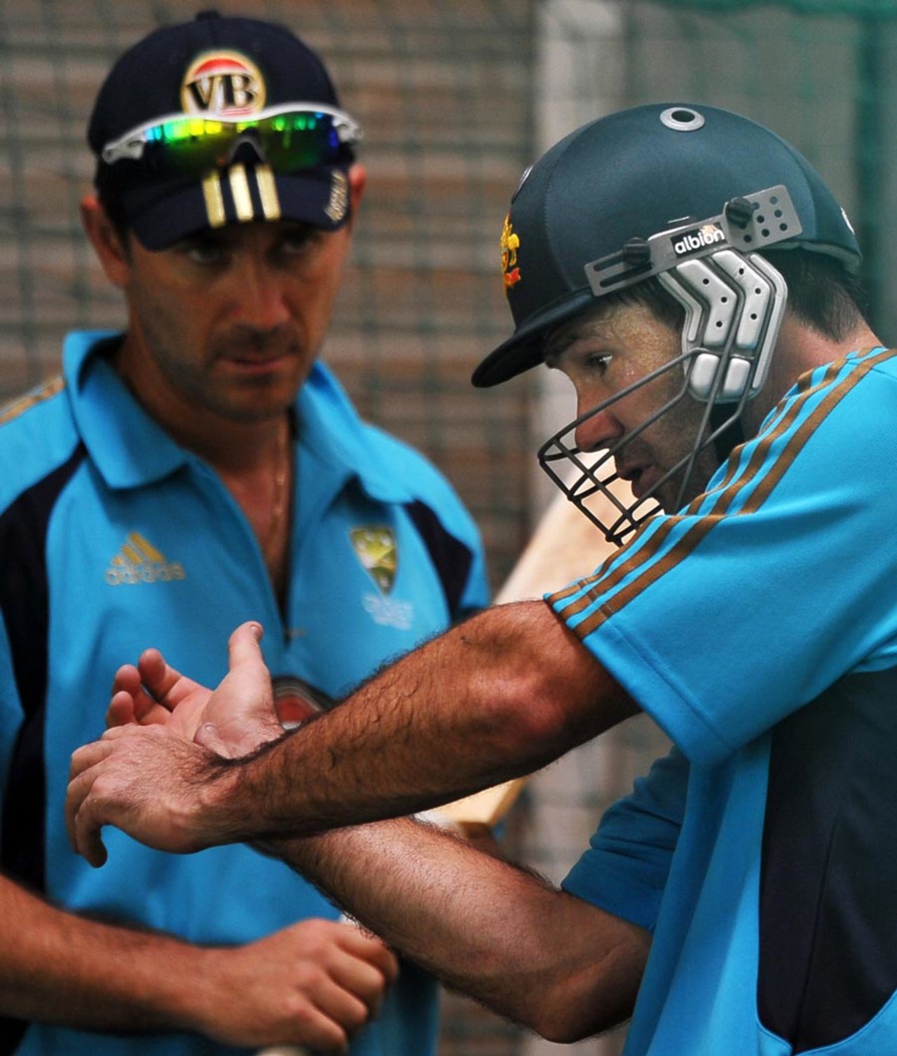 Ricky Ponting discusses a shot with batting coach Justin Langer, Chandigarh, September 23, 2010