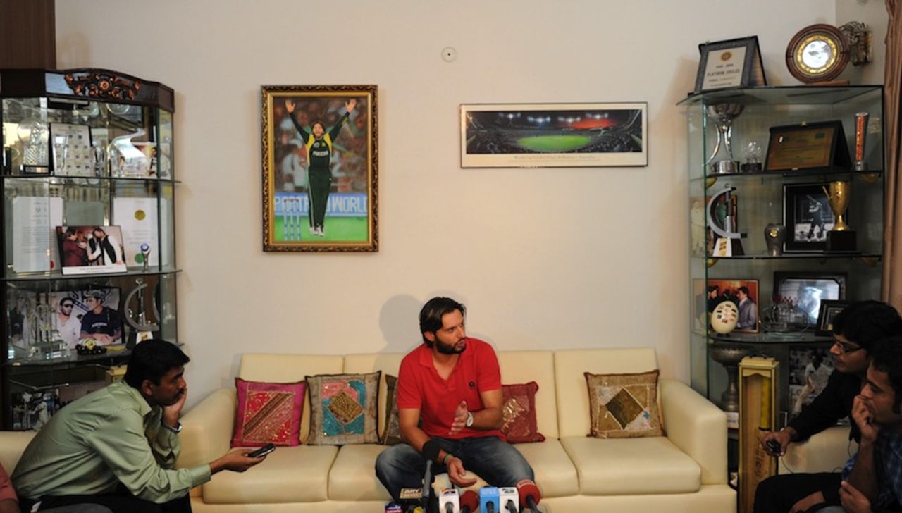 Shahid Afridi speaks to reporters at his house after returning from England, Karachi, September 23, 2010