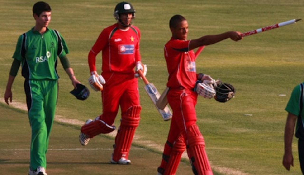 Ed Rainsford celebrates after hitting the winning runs, Zimbabwe v Ireland, 1st ODI, Harare, September 26, 2010