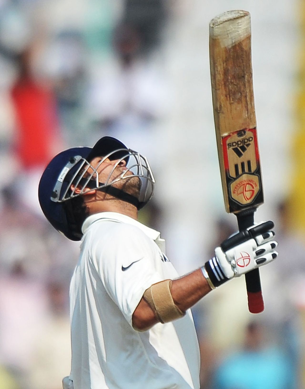 Sachin Tendulkar celebrates on reaching his half-century, India v Australia, 1st Test, Mohali, 3rd day, October 3, 2010