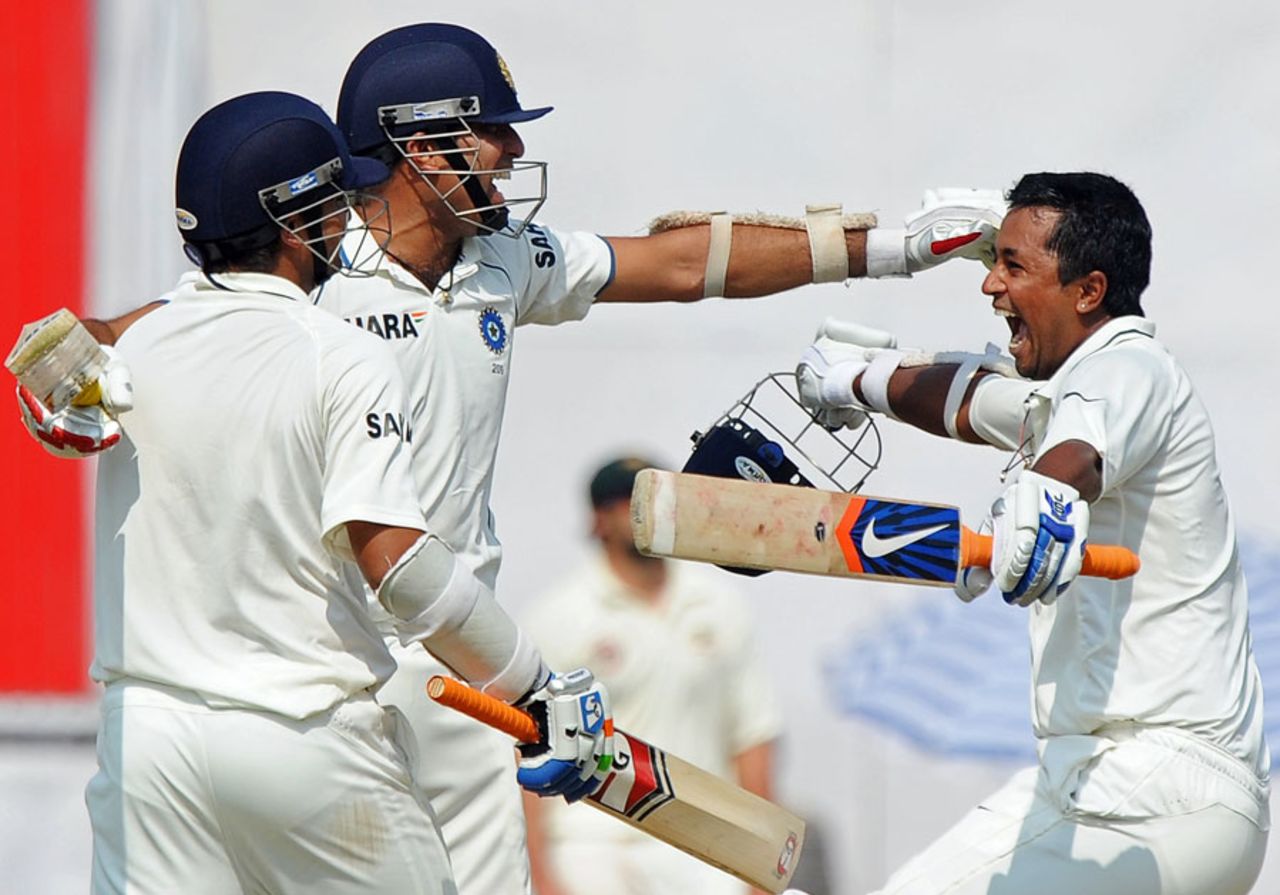 VVS Laxman, Suresh Raina and Pragyan Ojha come together in an embrace moments after sealing victory, India v Australia, 1st Test, Mohali, 5th day, October 5, 2010