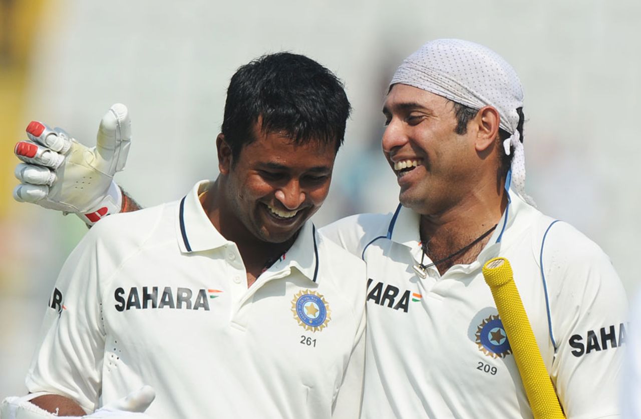 VVS Laxman and Pragyan Ojha celebrate the closest of victories, 1st Test, Mohali, India v Australia, 5th day, October 5, 2010
