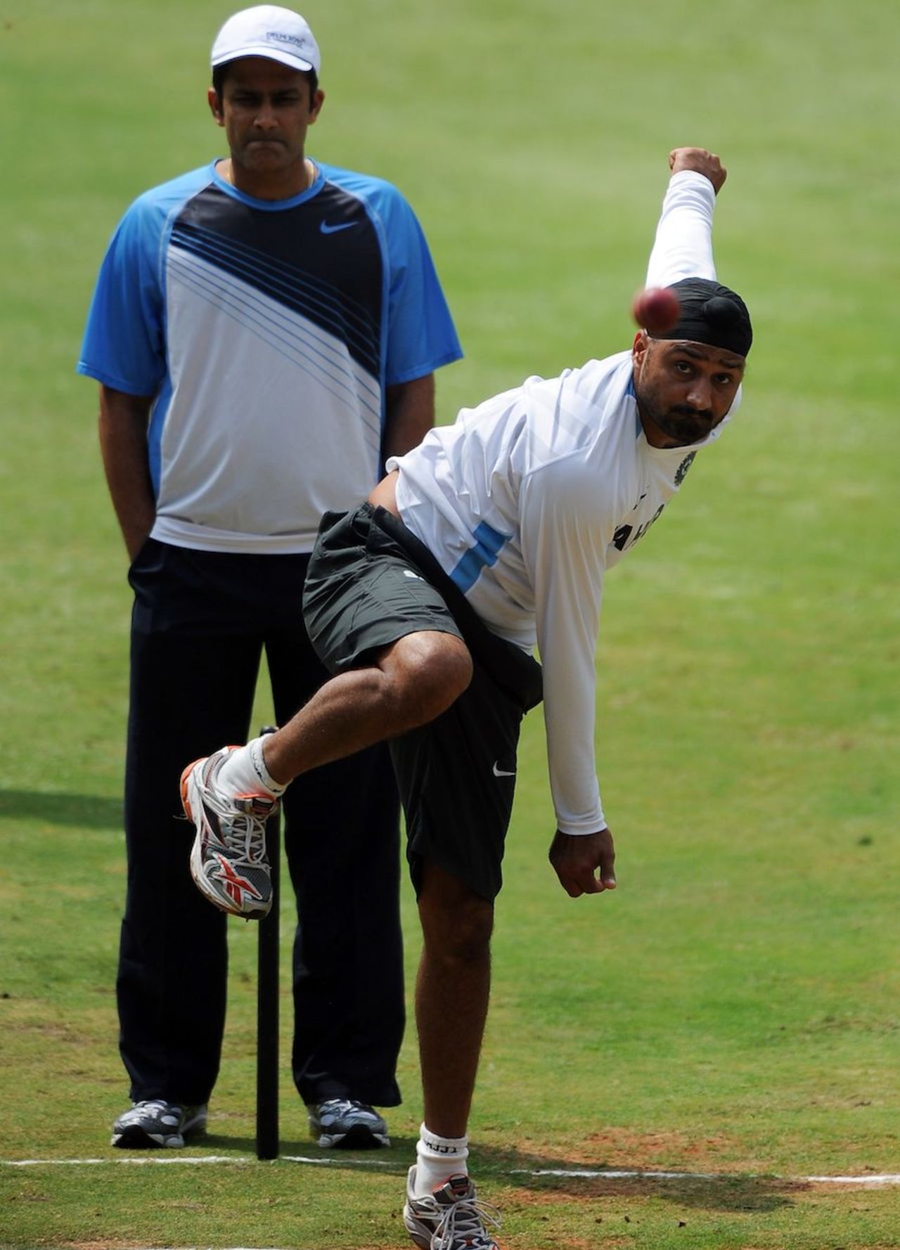 Anil Kumble watches Harbhajan Singh bowl, India v Australia, 2nd Test, Bangalore, October 8, 2010