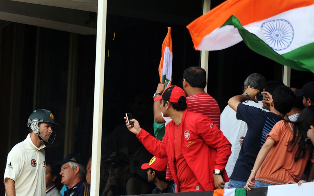Fans in the Chinnaswamy Stadium take snaps of Ricky Ponting as he returns to the pavilion, India v Australia, 2nd Test, Bangalore, 1st day, October 9, 2010